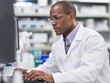 © Bijac - african american pharmaceutical scientist utilizing a computer in a lab, conducting research with a focus on innovation and discovery in the medical field