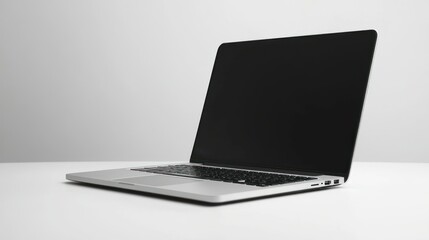Poster - A Closed Laptop Computer on a White Surface