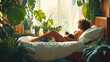 © Prasanth - A woman relaxes on a bed with her cat, surrounded by lush plants in a sunlit room filled with greenery and cozy decor