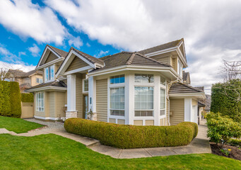 Fragment of a luxury house with a garage door in Vancouver, Canada. Horizontal orientation.