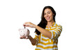 © PeopleVideos - Girl holding a piggy bank as a symbol of financial responsibility