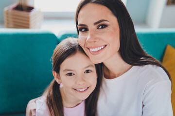 Wall Mural - Photo portrait of positive pretty daughter with mommy time together indoors apartment room