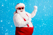 © deagreez - Photo of style stylish fat santa claus with big belly beard raise fists win x-mas christmas lottery wear suspenders overalls sunglass isolated over blue color background