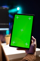 Poster - programmer using isolated screen tablet to fix vulnerabilities in software, close up. man taking car