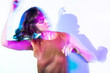 © ADDICTIVE STOCK - Young woman in vibrant double exposure effect
