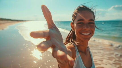 Portrait of a woman enjoying a workout on the beach, capturing summer fitness goals in the sun. Happy athlete engaging in a video call for a fitness blog