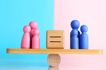 Wall Mural - Gender equality concept. Cube with equals sign between male and female figures on scales against color background