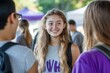 © kitipol - A group of freshmen attending a campus welcome event, meeting new friends and getting involved in student organizations