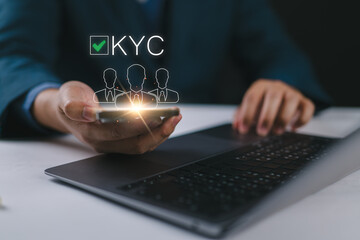 Leinwandbilder - Know your customer (KYC) concept, Businessman using laptop and smartphone with identity verification symbol for Increase financial security and access personal financial data. Biometrics security.