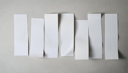 vertical white paper strips