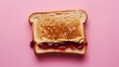 © Bonnie - A toasted peanut butter and jelly sandwich on pink background