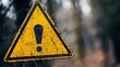 © Rawf8 - Warning road sign. Exclamation mark in a yellow triangle in the countryside