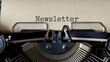 © Axel Bueckert - Old-fashioned newsletter typed on aged paper with vintage typewriter for retro communication concept