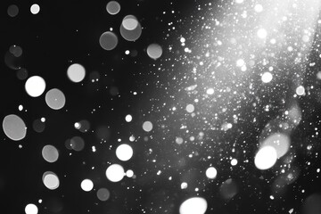 Wall Mural - sparkling monochrome glitter background with light bokeh effect