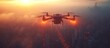 Drone flying over a city at sunset.