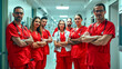© Констянтин Батыльчук - A group of doctors standing in a hospital hallway with their arms crossed