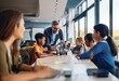 © YiuCheung - A group of children, including a teacher, work together in a classroom on a STEM project with a robot.