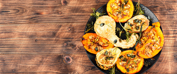 Wall Mural - Butternut squash half with pumpkin seed.