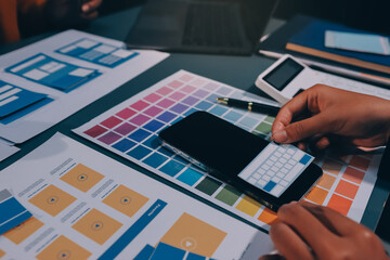 The designer team is designing the uxui system to make the uxui system work well on new phones and support system updates. Website development concept UI UX front end designer