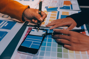 The designer team is designing the uxui system to make the uxui system work well on new phones and support system updates. Website development concept UI UX front end designer