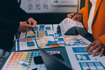The designer team is designing the uxui system to make the uxui system work well on new phones and support system updates. Website development concept UI UX front end designer