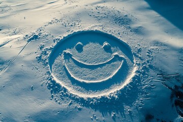 Wall Mural - A face drawn in the snow, smiling and looking at the viewer, showing emotions. Postcard with copy space. Concept weather, congratulations, holiday, advertisement, announcement, poster, layout.