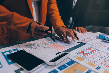 The designer team is designing the uxui system to make the uxui system work well on new phones and support system updates. Website development concept UI UX front end designer