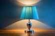 © suchetpong - Medium shot of lamp with blue shade on table