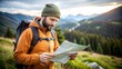 © imagemir - Man Tourist in a Hiking Outfit Looking at a Map Outdoors