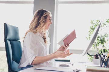 Poster - Photo of lovely young lady sit table talking video call notebook dressed formalwear comfortable startup office room interior