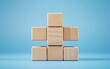 © JP STUDIO LAB - Minimalistic SEO concept with wooden blocks stacked against a blue background, representing online search optimization in a clear and simple style