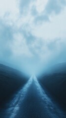 Poster - A road with a foggy sky in the background