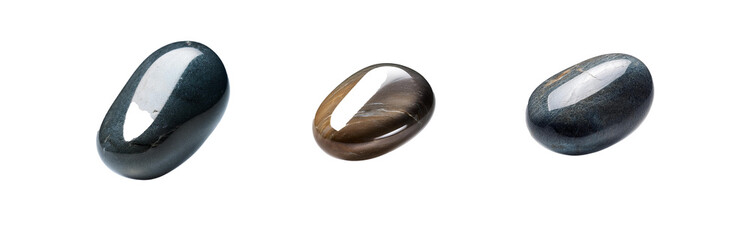 Aufkleber - Three smooth, oval stones, isolated against a white background.