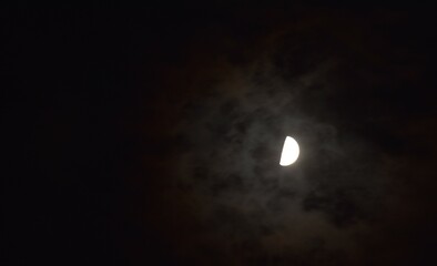 Wall Mural - half moon floating on dark sky in night