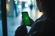 © vasyan_23 - Woman using smartphone with green checkmark screen for secure mobile confirmation