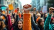 © Lion - Demonstration with a crowd of international people, fists raised in solidarity, woman protests, international woman day
