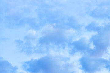 Wall Mural - a beautiful sky tinted by the sun leaving vibrant shades of gold, pink, blue and multicolored. cloud