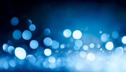 Wall Mural - blue abstract background banner with blue bokeh light effect in the dark with copy space