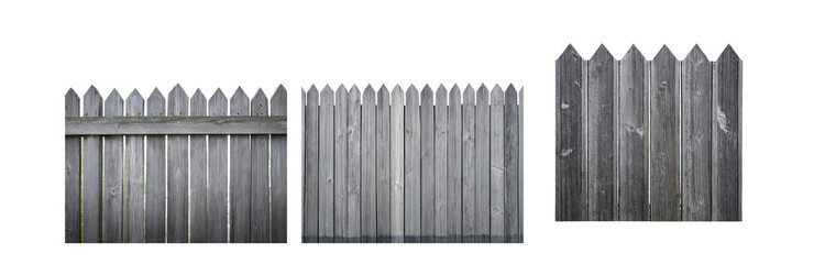 Poster - Gray wooden fence with pointed tops, viewed from the side.