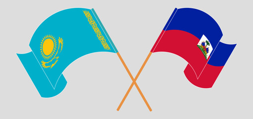 Wall Mural - Crossed and waving flags of Kazakhstan and Republic of Haiti. Vector illustration