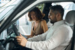 © Viacheslav Yakobchuk - Loving couple buying new car, reading documents