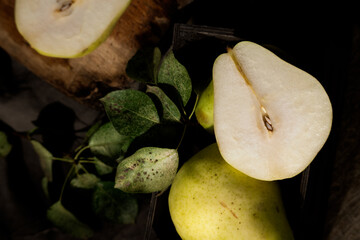 Autumn pears on table, fresh raw food ingredients
