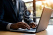 © Quality One   - businessman working with laptop, surrounded by law icons and business graphics, showcasing innovation and productivity in modern office environment