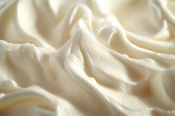 Poster - Close-up shot of white frosting on a cake, perfect for food, baking, or dessert themed projects