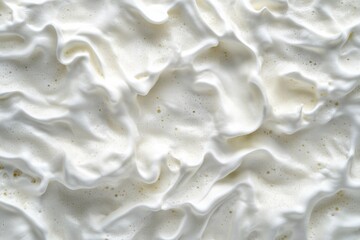 Sticker - A close-up shot of fluffy whipped cream on a table, ideal for food and dessert photography