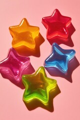 Poster - A close-up shot of a star-shaped candy sitting on a pink surface