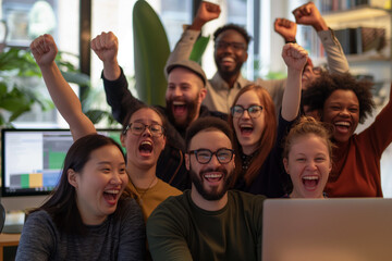 Diverse group of coworkers celebrating a team success together