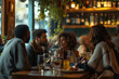 © Micha - Diverse group of friends dining together at a restaurant