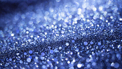 Poster - beautiful blue bokeh background with shimmering glimmers of light creating a dreamy atmosphere at tw