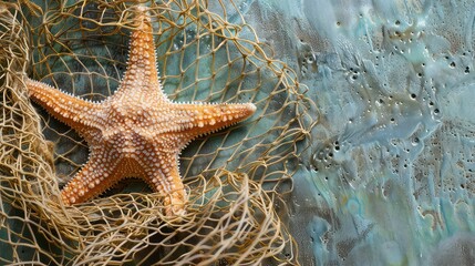 A close-up of a starfish entangled in a net against a textured, blue-green background.
